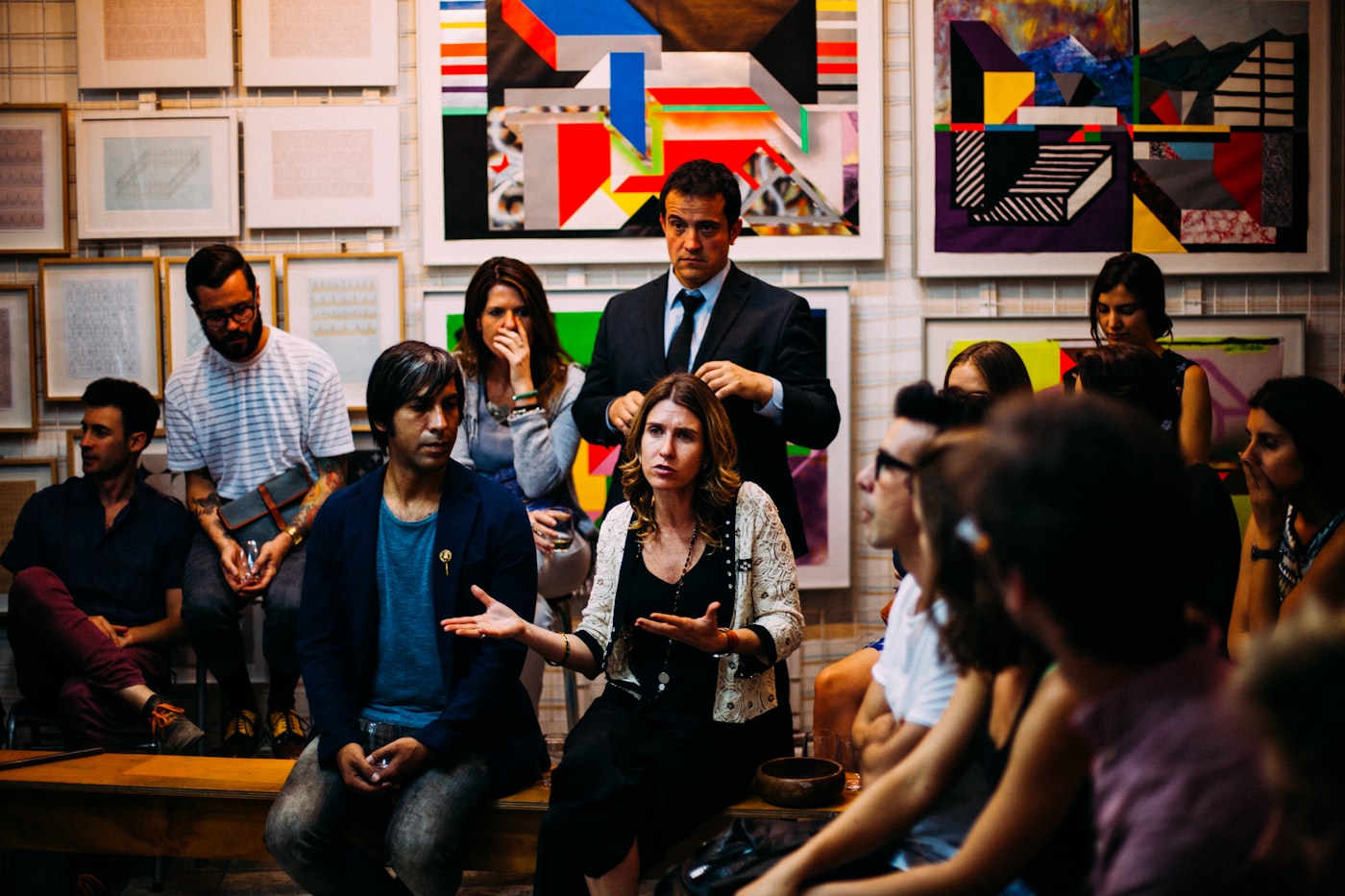 A corporate team workshop around a large studio table